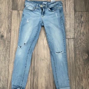 light blue ripped jeans